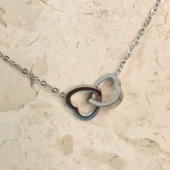 Kalung couple hati titanium