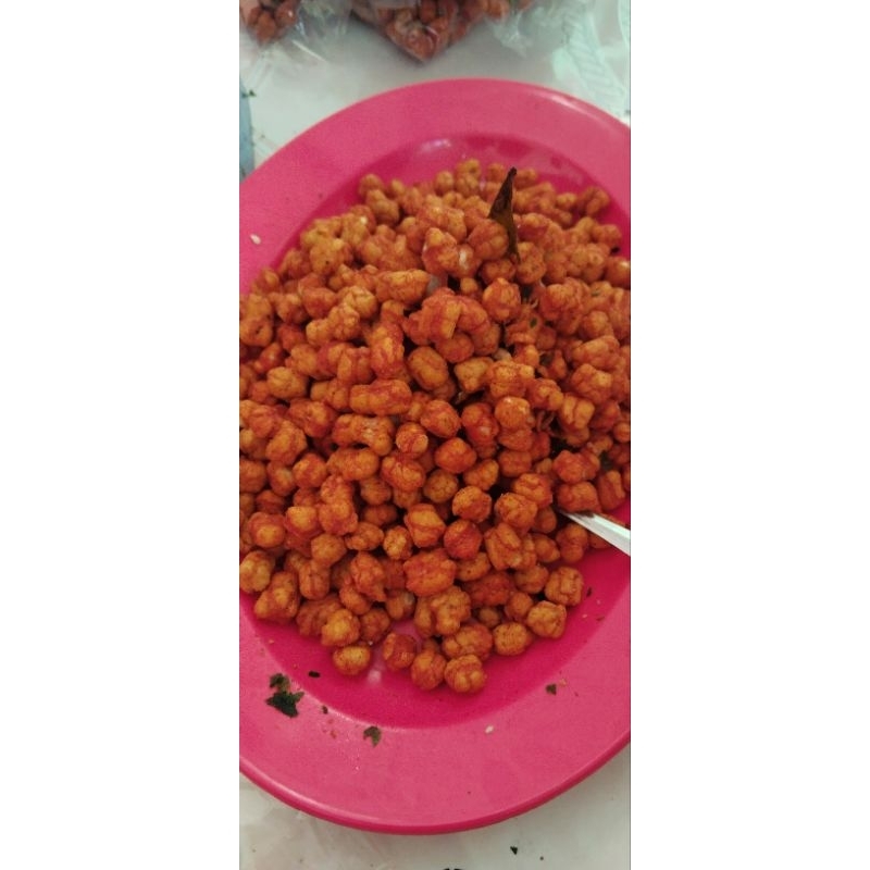 

tik tik pedas daun jeruk berat 1 KG renyah terbuat dari rempah pilihan dengan wangi duan jeruk