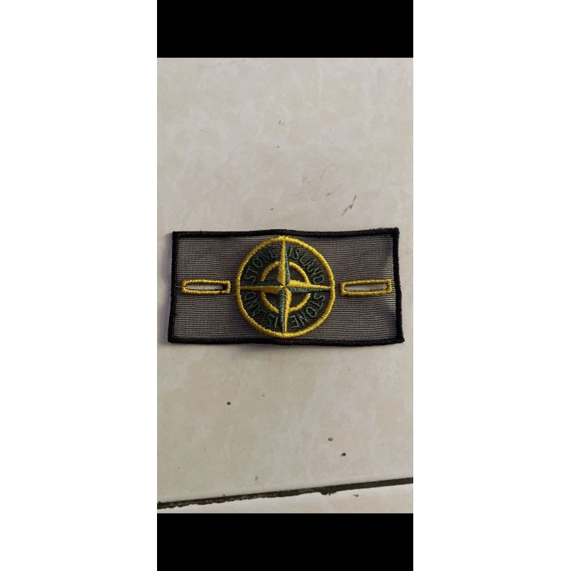 Mesh badge stone island