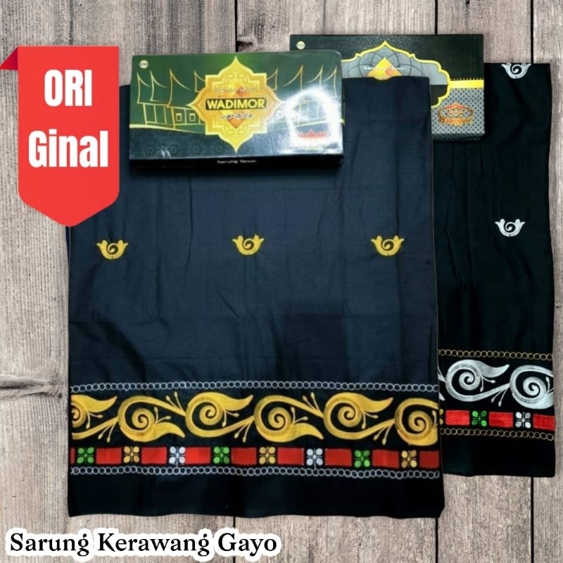 sarung bordir wadimor warna hitam,benang kuning,motip kerawang gayo
