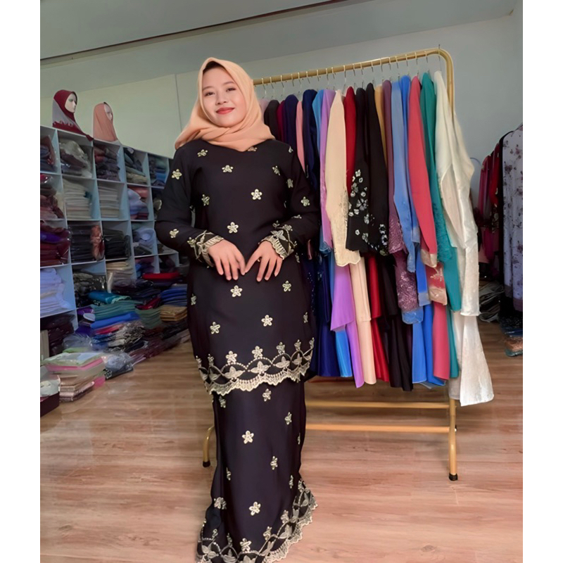 Baju kurung sulam