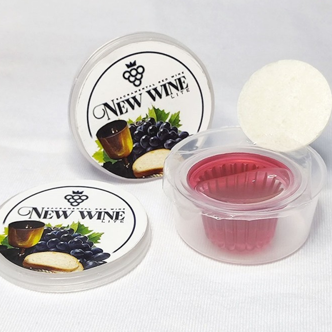 

Minuman Gereja Cup Lite Isi 100+Roti Polos Kecil