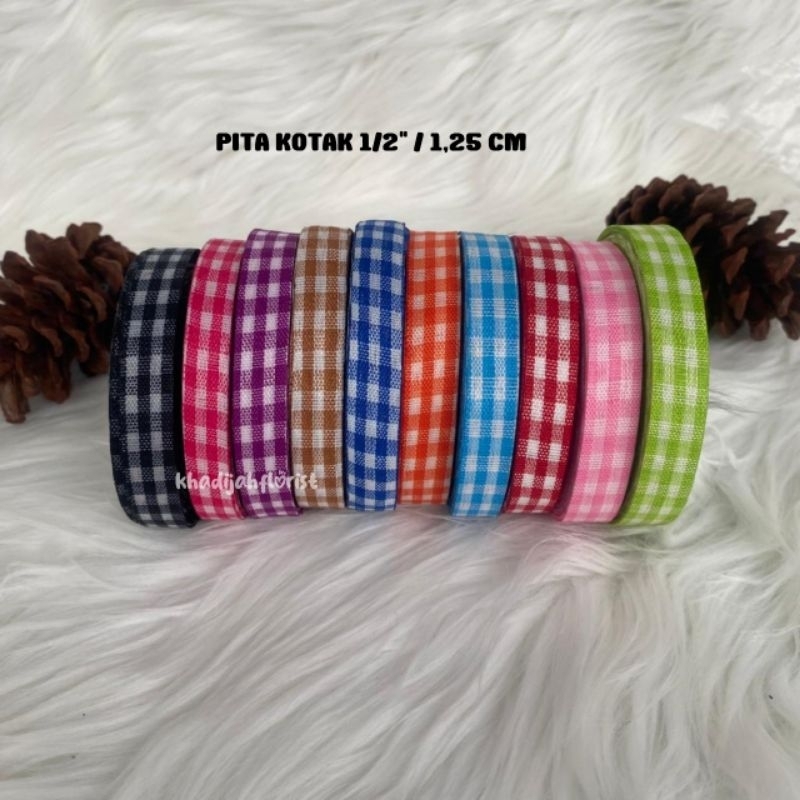 

Pita Kotak 1/2" / 1,25 Cm Panjang 20-25 Yard