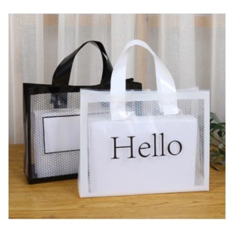 

PAPER BAG BESAR TRANSPARAN (PLASTIK) 27 X 8 X 27 CM