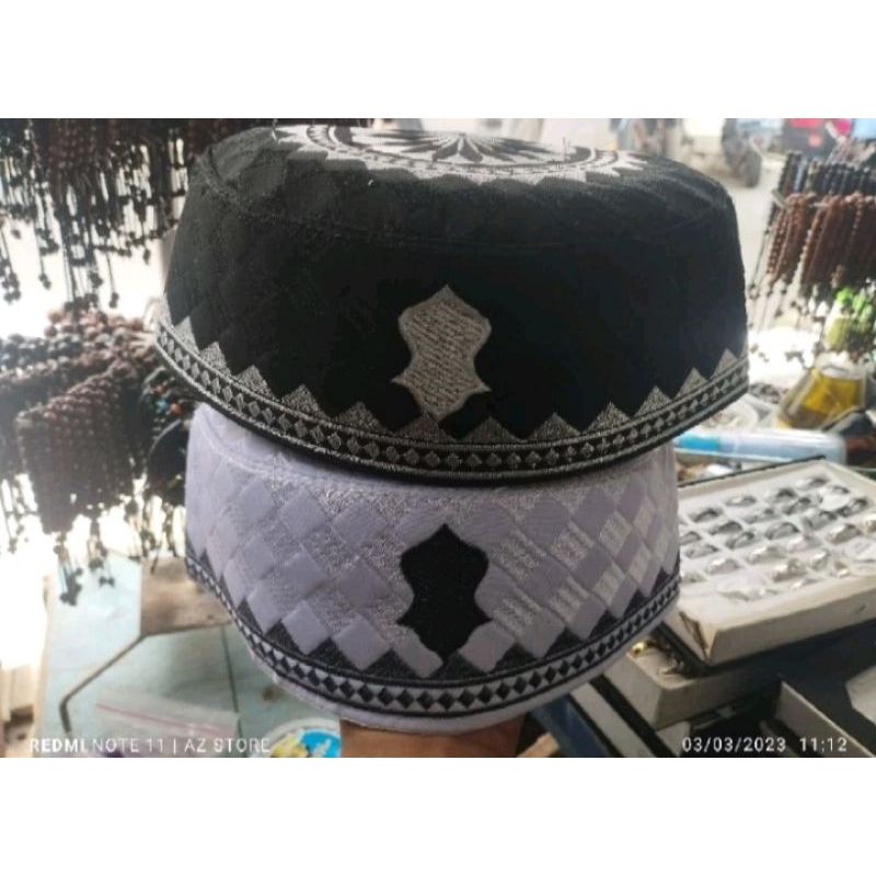 Kopiah/peci terompah