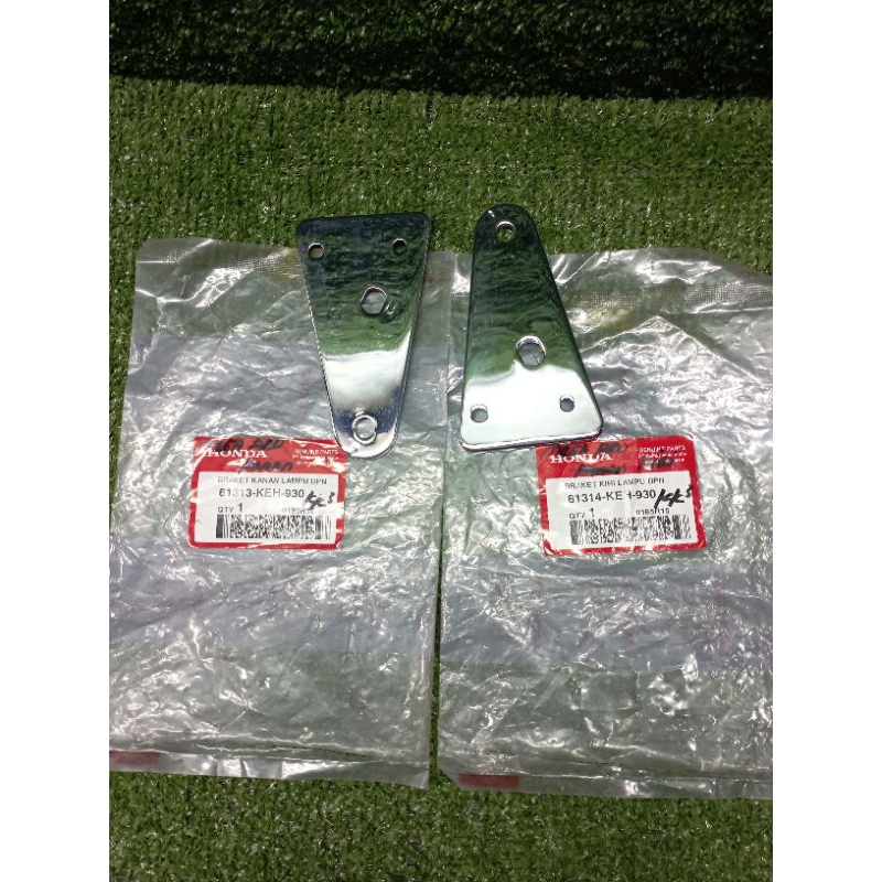 kupingan lampu depan Megapro lama original (61314-KEH-930)