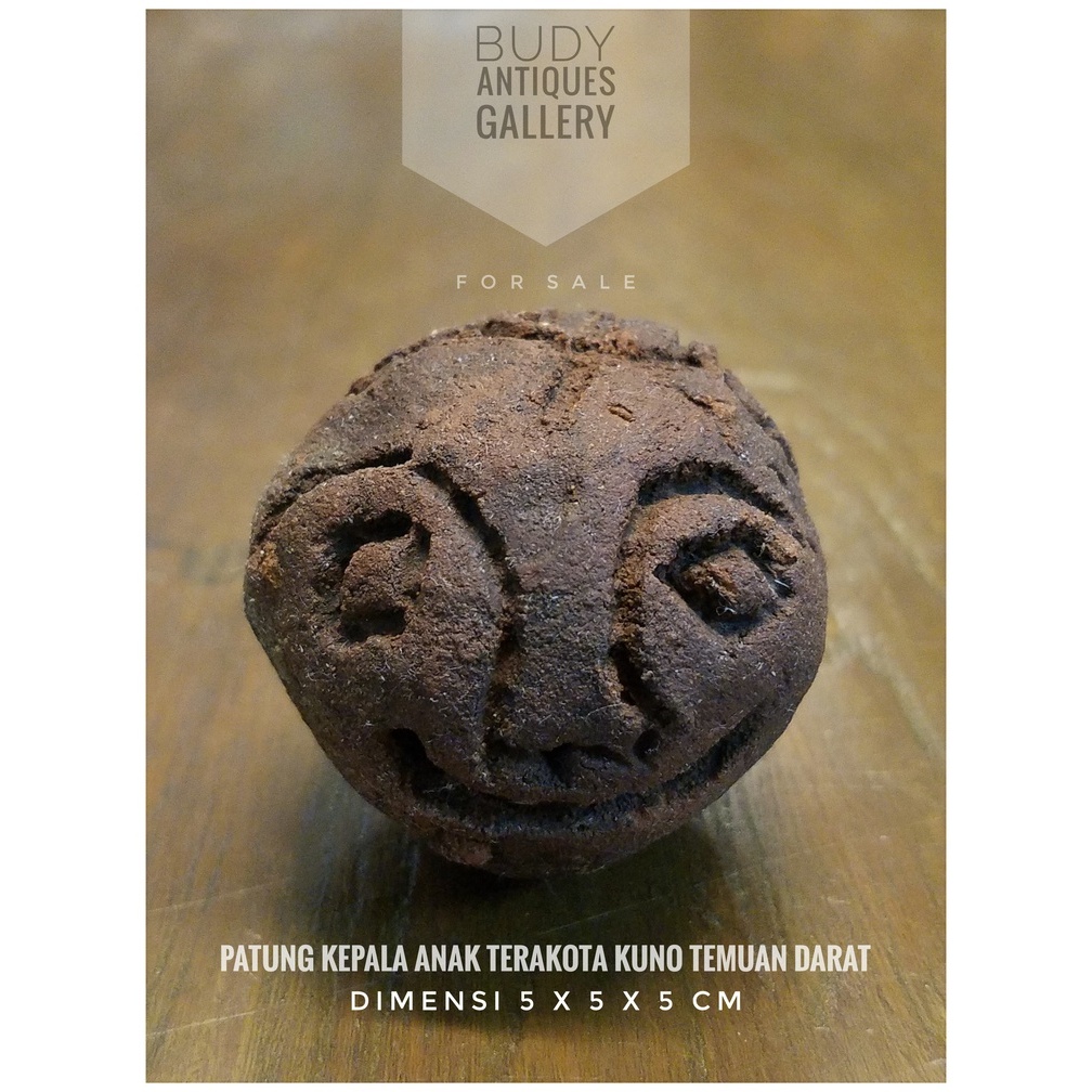 Patung Terakota Kepala Anak Temuan Darat