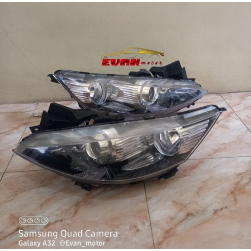 Headlamp lampu depan Mazda Biante