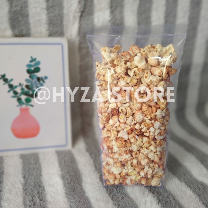 

Hyza PopCorn Cemilan Murah Berkualitas Rasa Pedas 60gr