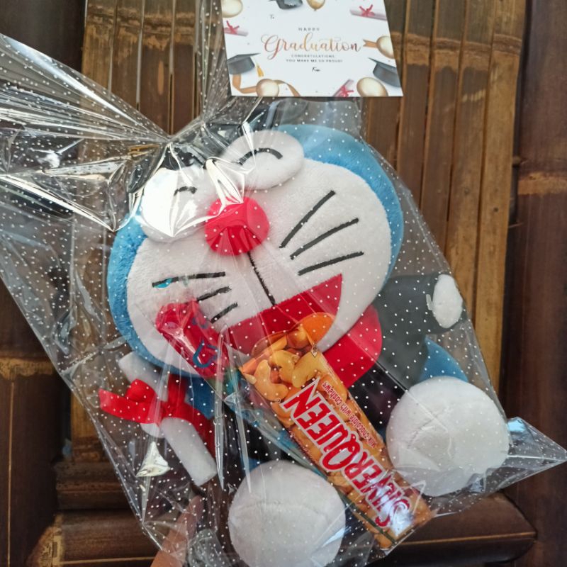 

Parcell Coklat & Boneka Doraemon Wisuda size L