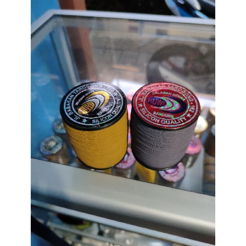 GELASAN HUWI LABEL HITAM & MERAH 0.22 2000 YARD