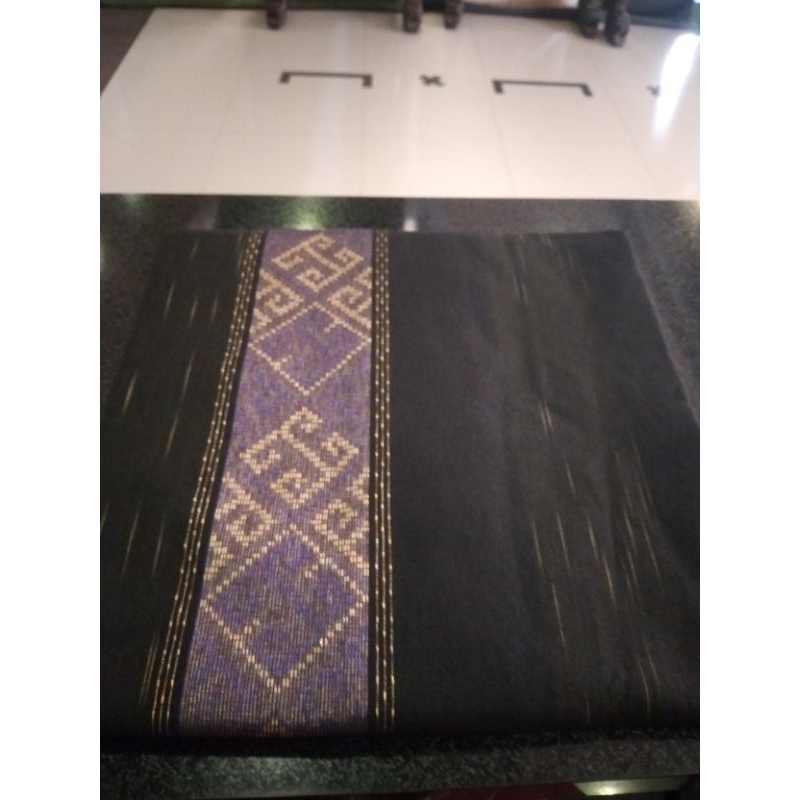 Tenun troso kamen hujan gerimis