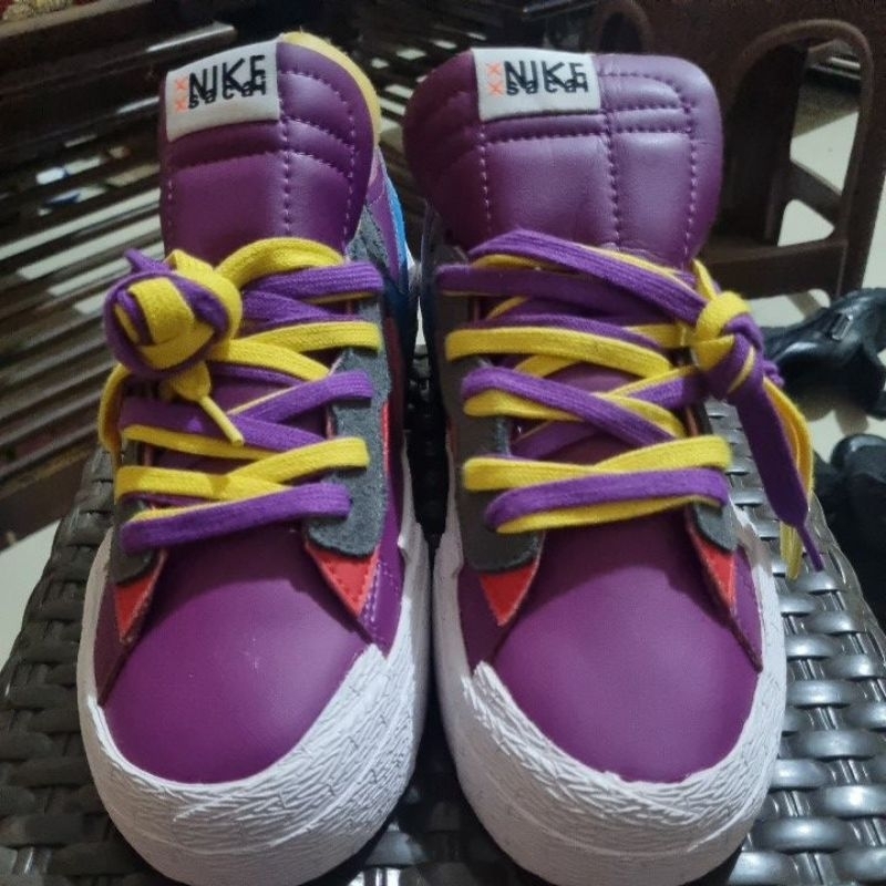 SEPATU SACAI X KAWS PURPLE/sepatu_trendi_masakini