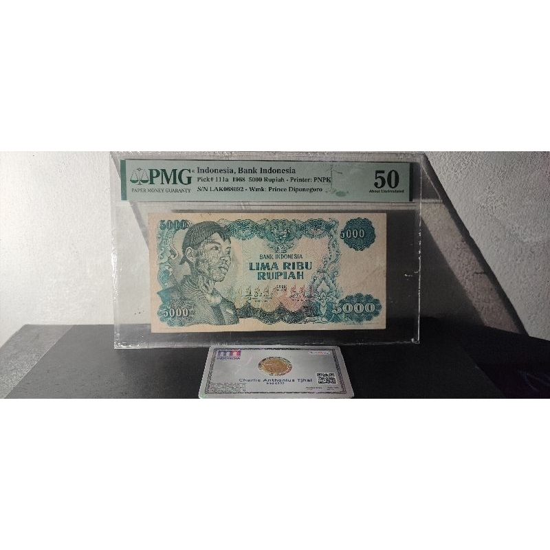 Uang Kuno 5000 Rupiah Sudirman PMG 50 MINOR RUST