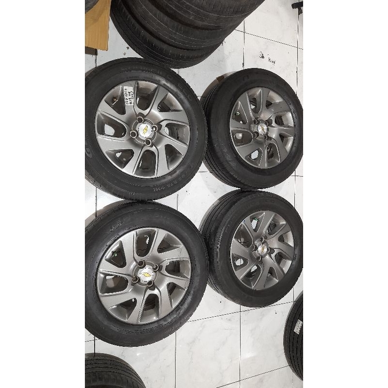 Velg Bekas Copotan SPIN Ring 15X6 Lubang 4X100 ET39 Plus BAN 195 65 R15
