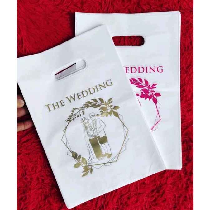 

Kantong plastik the wedding (isi 50pcs) ukuran 20x30 dan 25x35 plastik bingkisan snack hajatan & souvenir