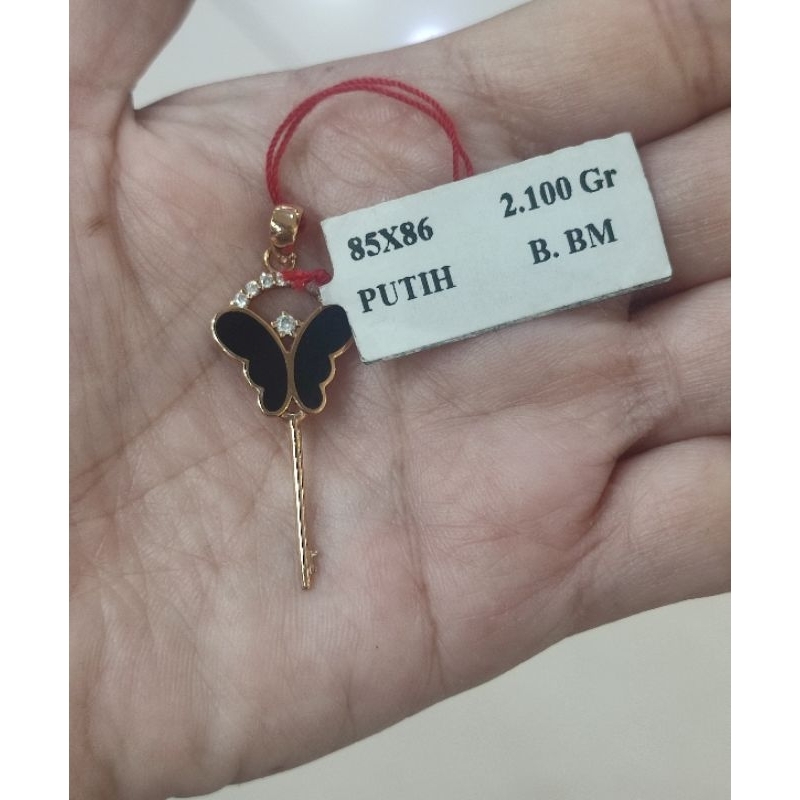 Liontin emas 75 kunci kupu kupu
