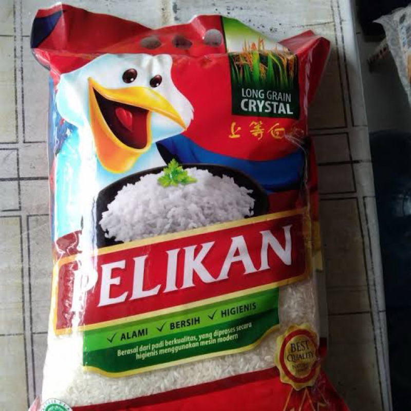 

Beras cap Pelikan kemasan 5kg dan 3 kg