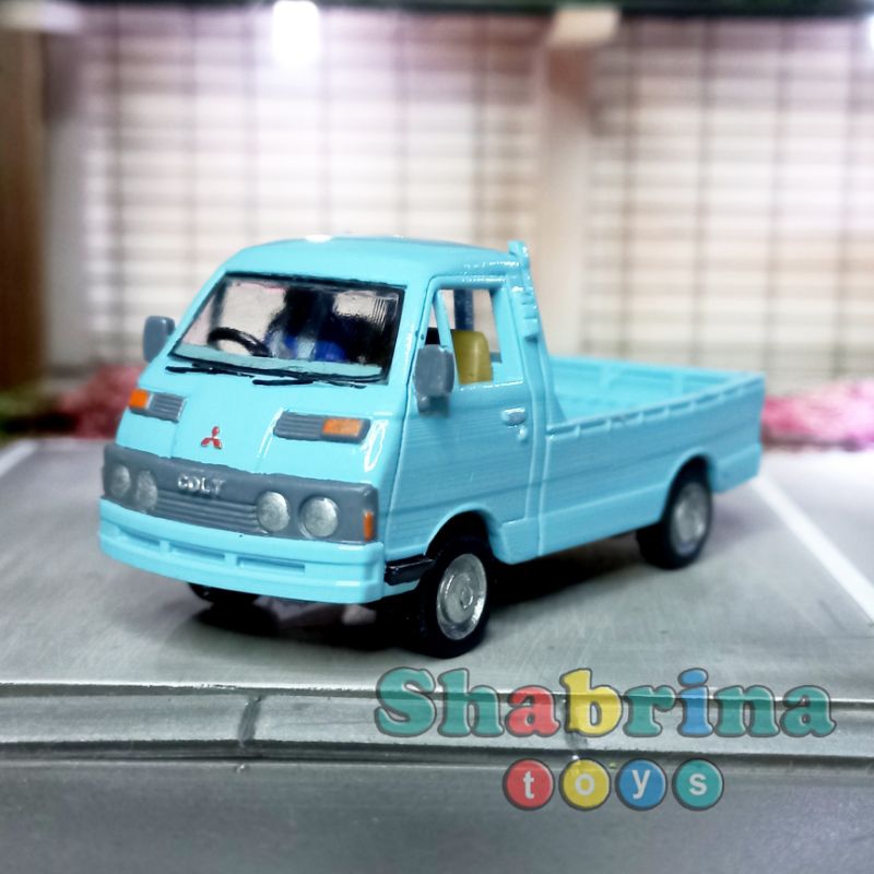 Miniatur MITSUBISHI COLT T 120 PICK UP 1980 - Skala 1/64