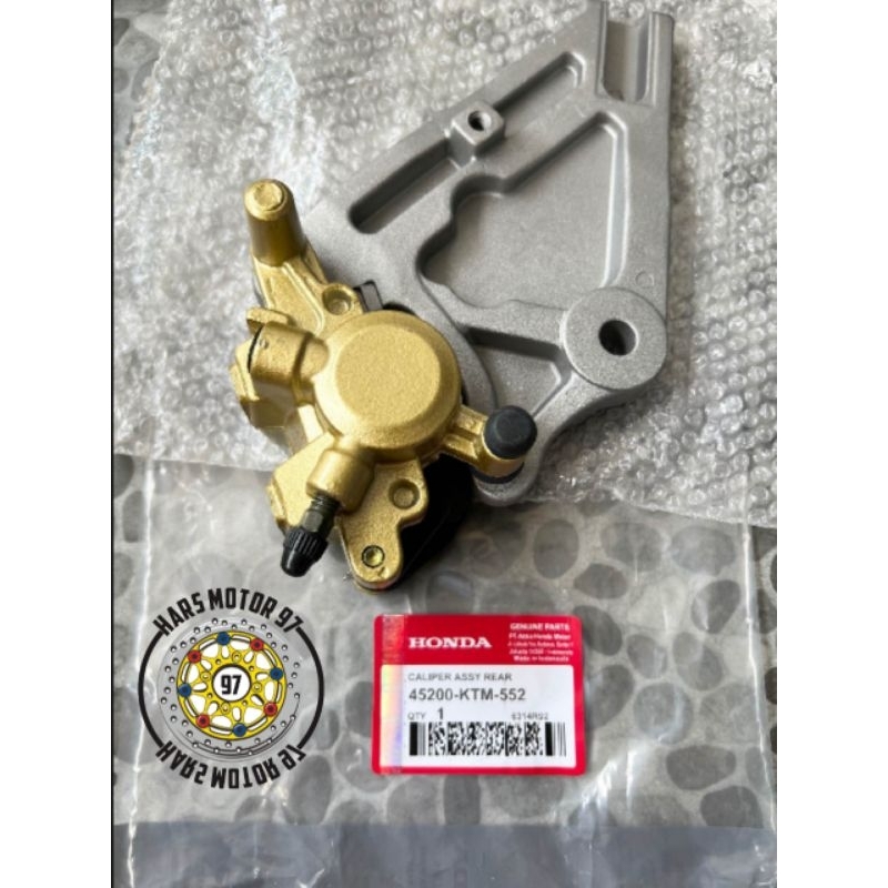 KALIPER PALA BABI BELAKANG PLUS BRAKET SUPRA X 125 KTM ORIJINAL