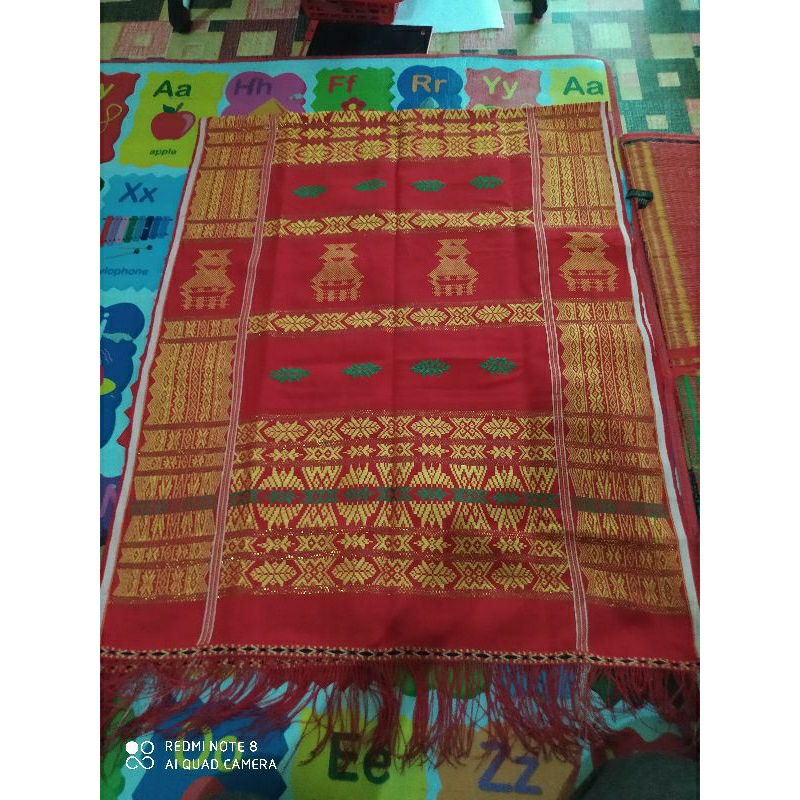 uis  nipes untuk adat batak karo