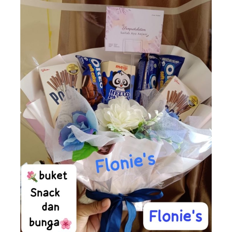 

BouquetBunga Bucket snack dan bunga wisuda sempro ulang tahun naik kelas