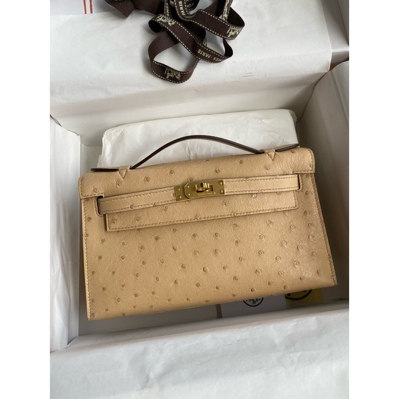 HM Ostrich Kelly Pochette Cream GHW