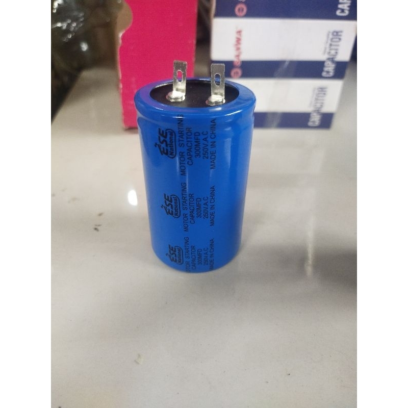 Kapasitor Bulat 100UF ,Dan  300UF 250V Biru National ESE