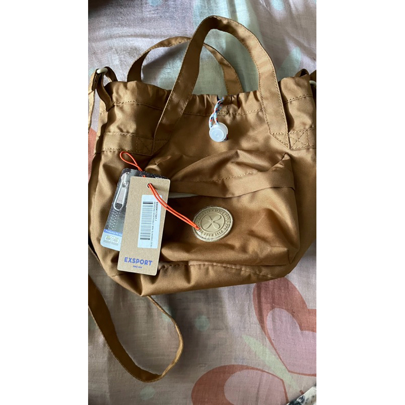 WTS tas exsport reround mini slingbag - cokelat