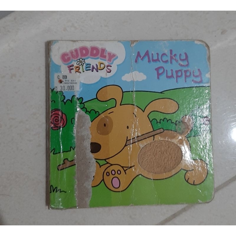 

preloved buku mucky puppy
