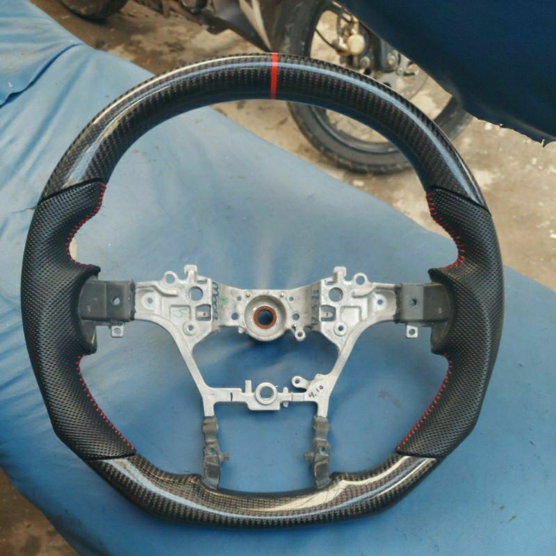 LINGKAR STIR CARBON KEVLAR,FORTUNER VRZ..