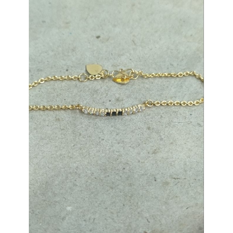 gelang nori mata hitam putih sebaris 2 gram emas muda