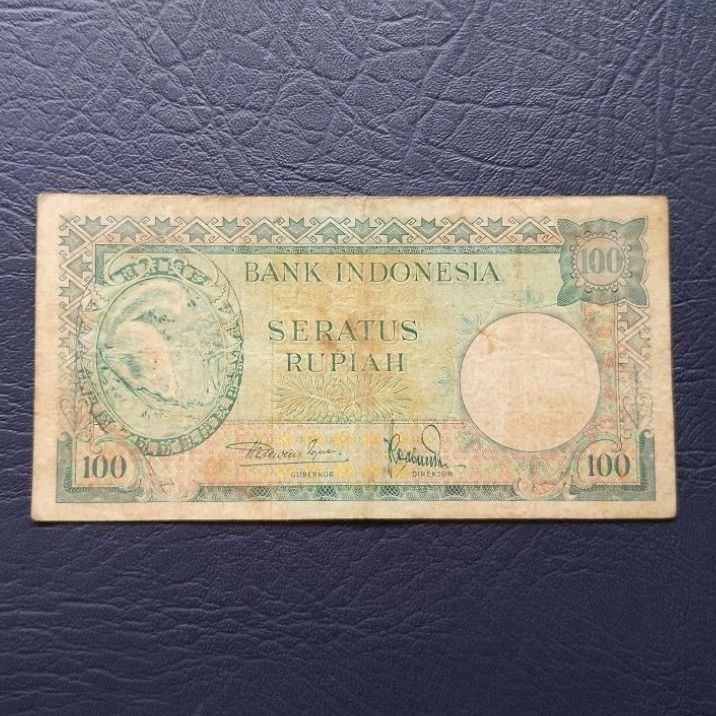 Uang kuno kertas 100 rupiah Tupai Seri Hewan tahun 1957