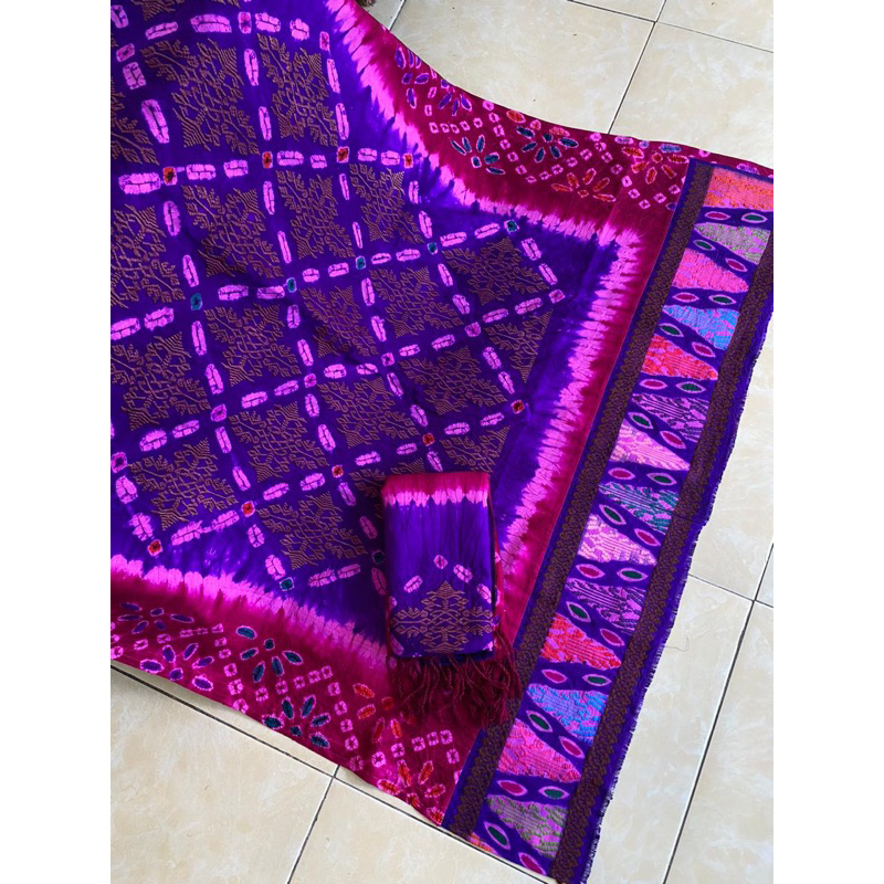 sutra jumputan cakra tumpal songket singaraja