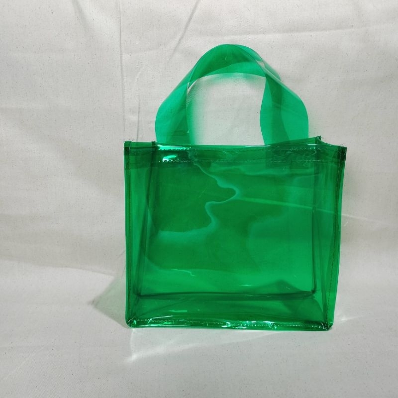 

Tas mika warna hijau size 25*10*20 cm humpers lebaran bahan tebal PVC
