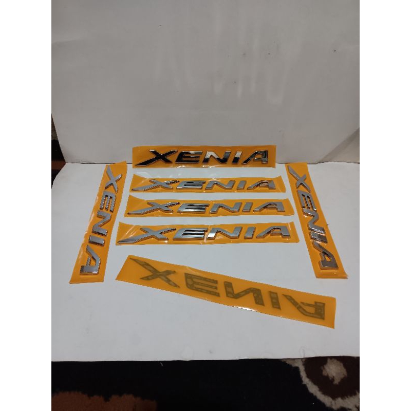 emblem xenia kap mesin