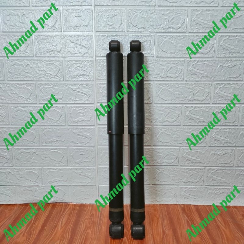 shock nissan navara d40 belakang