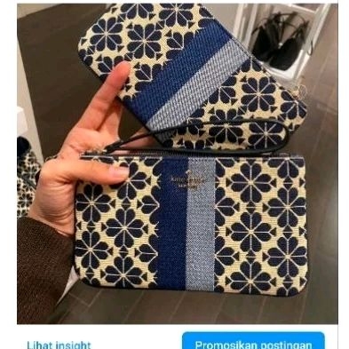 everything spade flower jacquard blue wristlet