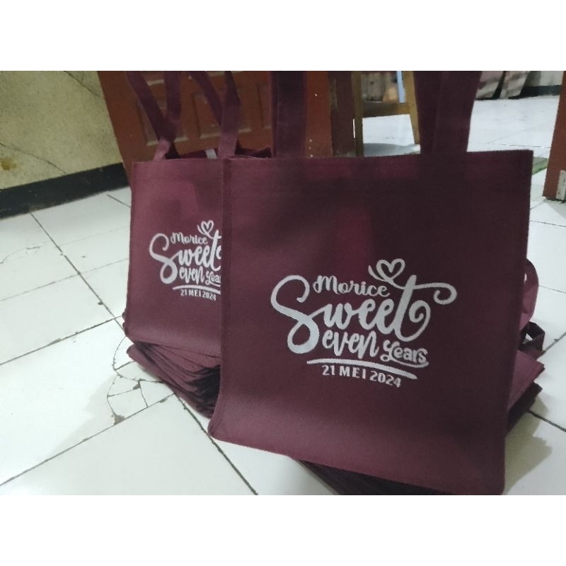 

tas kain spunbond nasi kotak sablon custom