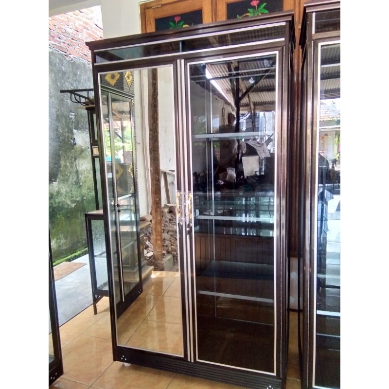 Lemari pakaian alumunium kaca riben mewah