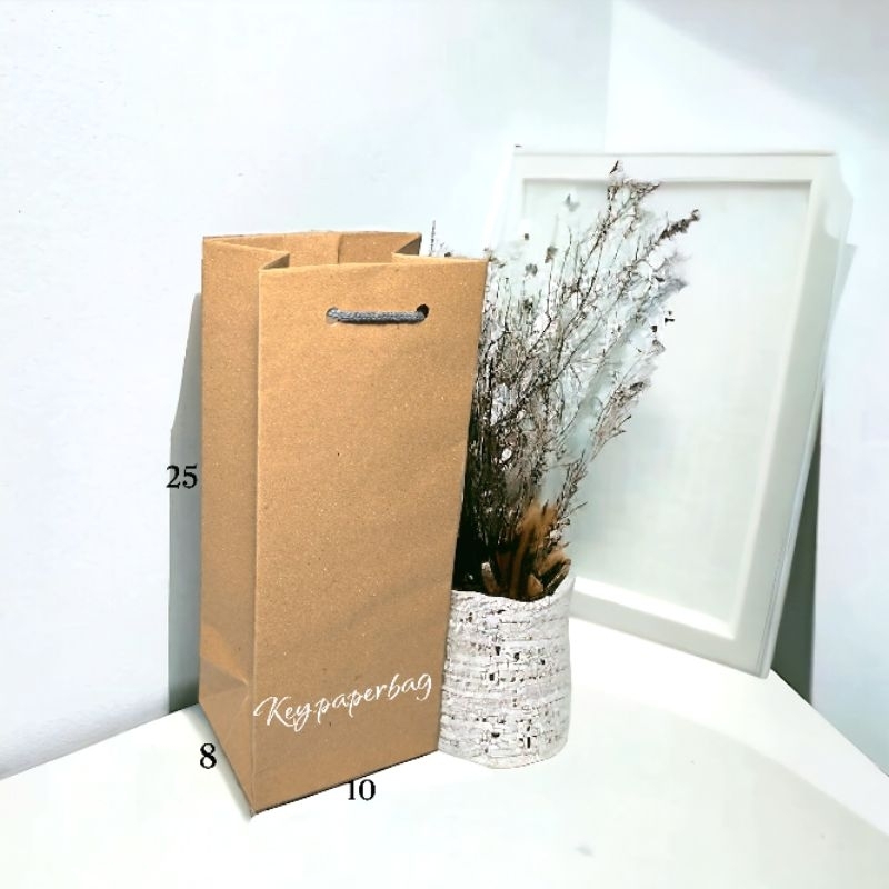 

Paper Bag Botol Polos Uk 10x8x25 Tebal