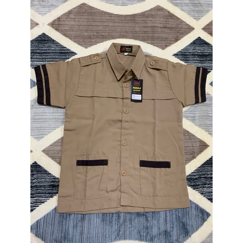 

Pramuka Siaga bahan oxfrod kenari premium tersedia lengan panjang dan lengan pendek