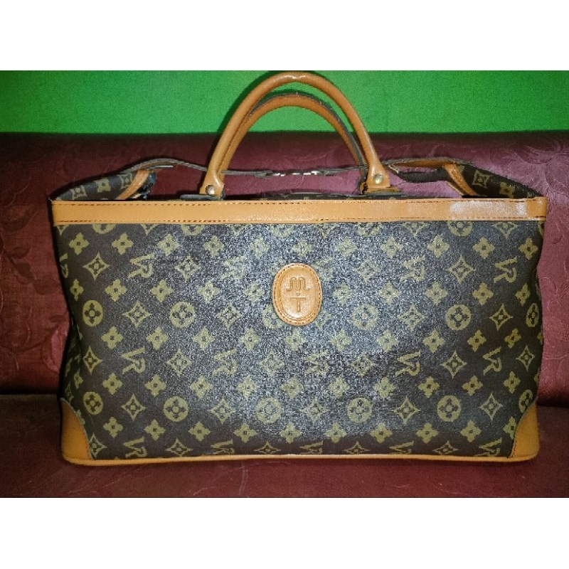 tas travel kulit seperti ala LV