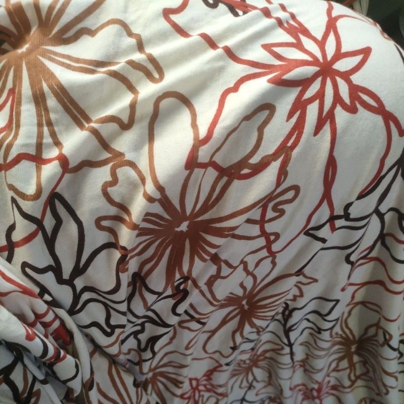 KAIN KILOAN KAOS PRINTING MOTIF BUNGA ILUSI COKLAT MERAH