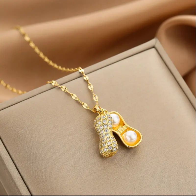 Kalung titanium liontin kacang mutiara cantik terbaru terlaris