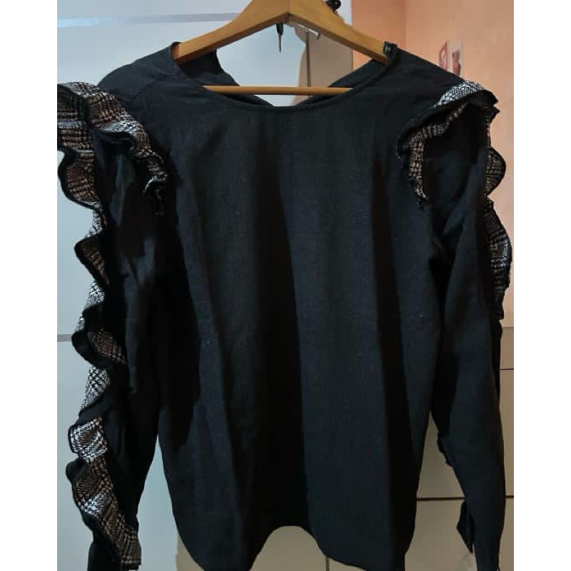 zara hitam