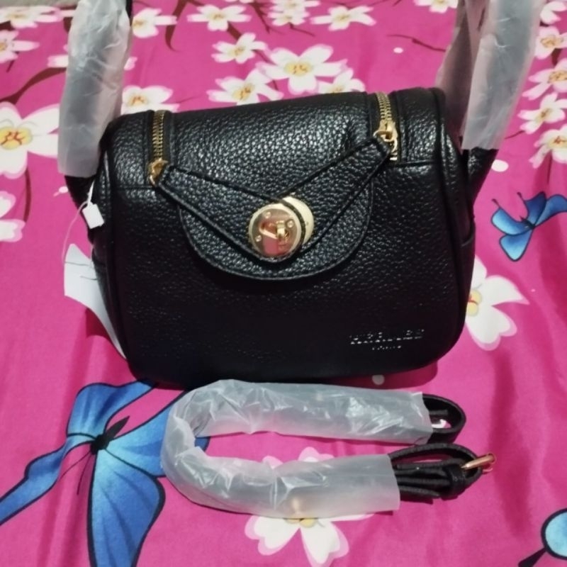 Tas lindi hitam