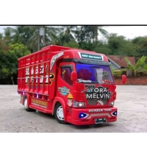 Mainan anak truk oleng canter warna merah fariasi lampu leed