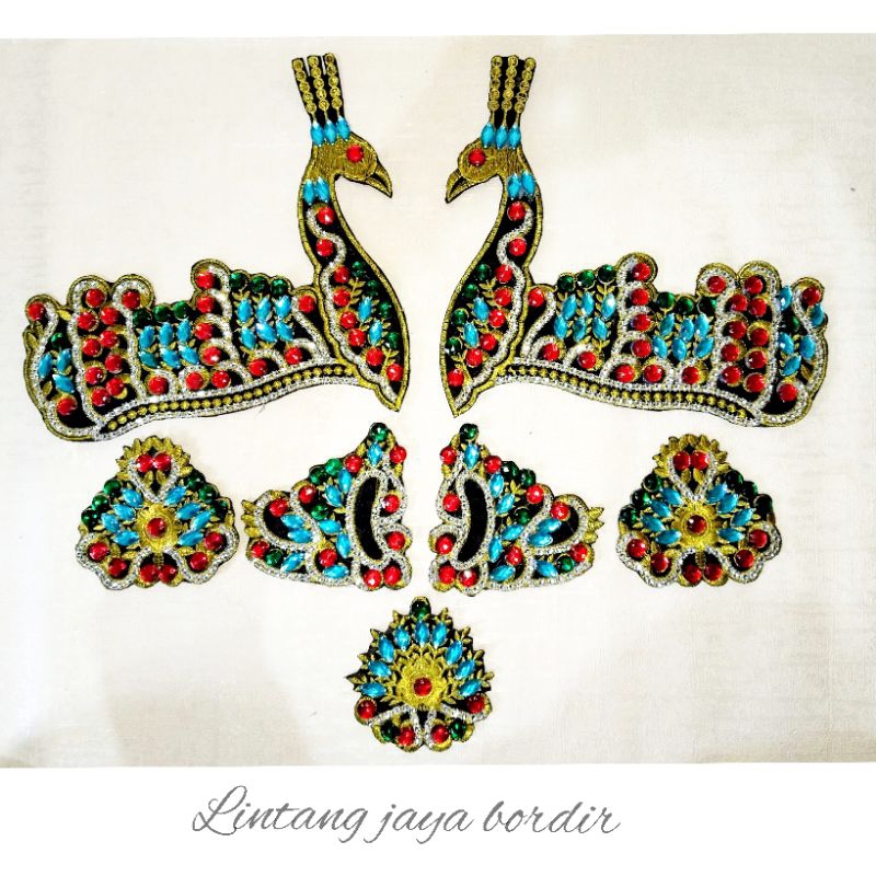 siger bordir akaesories tari merak