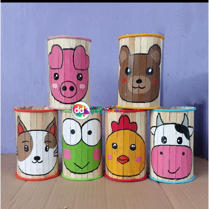 

prakarya kerajinan daur ulang kaleng ro dan stik eskrim (tempat pensil)